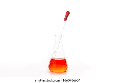 Orange Liquid In Glass Beaker