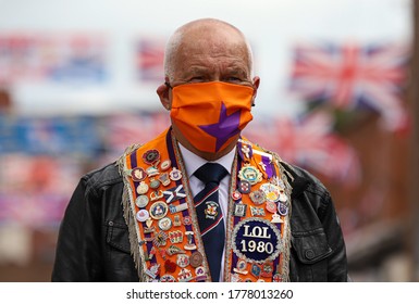 Orange Man, Brian McKee Wearing A Coronavirus Mask Takes Part In Socially Distanced Twelfth Celebrations In Belfast, July 13, 2020.