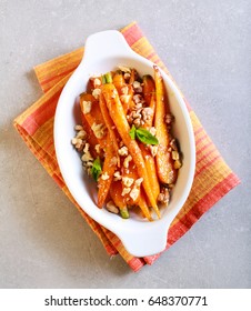 Orange And Maple Glazed Young Carrots With Nuts