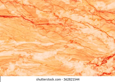 Orange marble texture background.