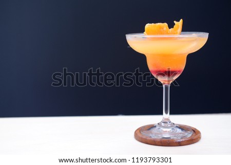 orange margarita cocktail and summer drinks copy space