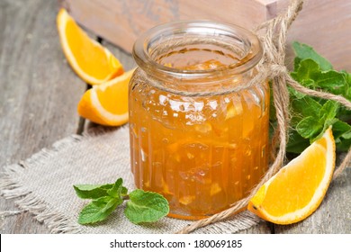 Orange Marmalade In A Glass Jar, Close-up, Horizontal