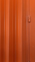 Orange Metal Rolling Door Vertical Lines In Perspective View, Background Image, 