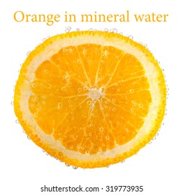 orange in mineral water isolated on white background