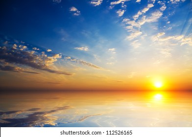 orange mystic sunset on the  sea - Powered by Shutterstock