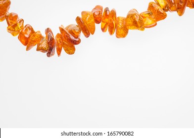Orange natural amber necklace with space for copy text