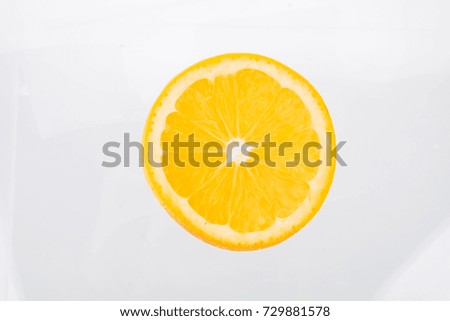 Similar – Orangenscheiben auf gelbem Hintergrund.