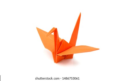 Orange Origami Crane On A White Background