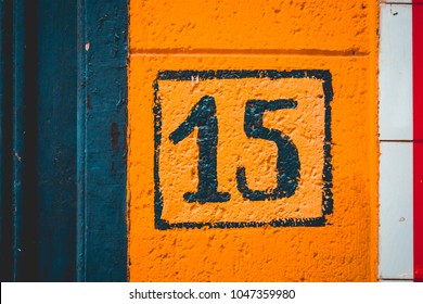 Orange Painted Number 15 Door Sign