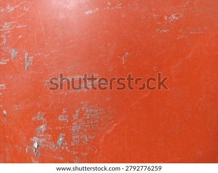 Orange Painted Surface Texture. Bright weathered paint background with scratches and worn marks, suitable for graphic design and creative backdrops
