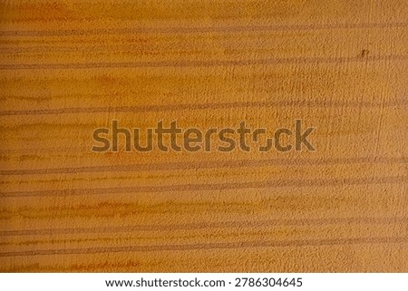 Orange painted wall with  streaks for rustic architecture and aged surface concept
