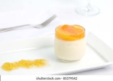 Orange Panna Cotta Isolated In White Background