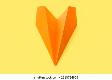 Orange Paper Plane On Yellow Background