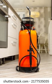 Orange Pesticide Container Close-up. Fight Against Insects In Apartments And Houses. Disinsection Of Premises.