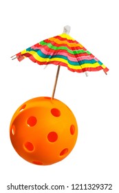 Orange Pickleball With Colorful Drink Umbrella On White Background.  