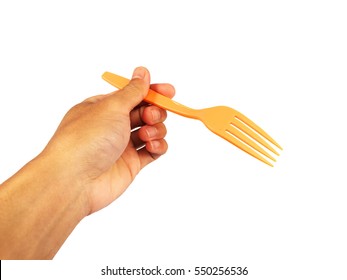 Orange Plastic Fork In Hand