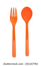 Orange Plastic  Fork And Spoon Isolated On White