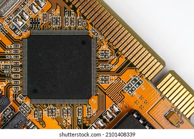 Orange Printed Circuit Board With Black Chip - Space For Text - In Middle, View From Above