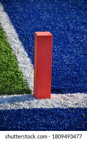 Orange Pylon In The End Zone Of A Football Field