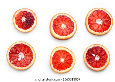 Orange red sweet ripe juicy sliced on a white background. Tropical fruit. Сopy space.Flat lay, top view.