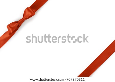 orange ribbon bow composition isolated on white background with shadow