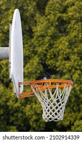 Orange Rim And White Backboard On Basketball Goal