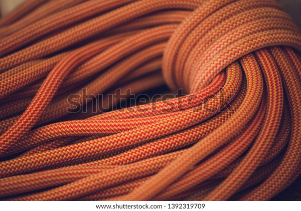 orange rope for climbing and climbing.\
background image of the rope for active\
sports.