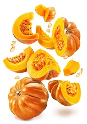 Orange Round Pumpkins, Pumpkin Slices With Pumpkin Seeds Falling Down On White Background. File Contains Clipping Paths.