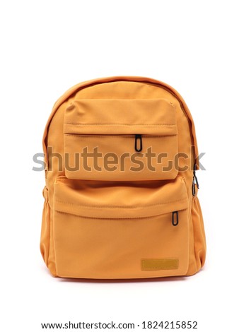 Orange satchel or backpack made of fabric on a white background