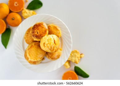 Orange Scone On White Plate
