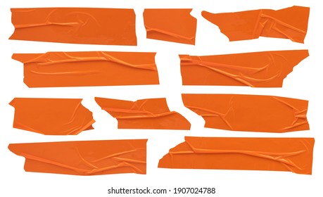 Orange scotch, set of sticky glued strips of various shapes, stationery on white background