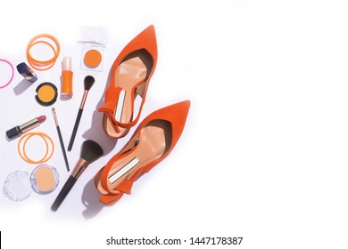 Orange Shoes With Cosmetics And Accessories. Flat Lay,
