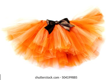 Orange skirt tutu with brown bow isolated on white background