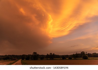 Orange Sky During Sahara Dust Storm In Europe Over Rural Area