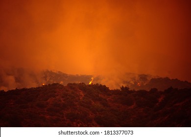 Orange Sky Over The Mountains Of California. Fires Near Los Angeles. Smoke Pollution In US Air
