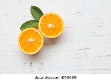 Orange Slices On White Rustic Wooden Background, Top View, Flat Lay, Summer And Healthy Concept