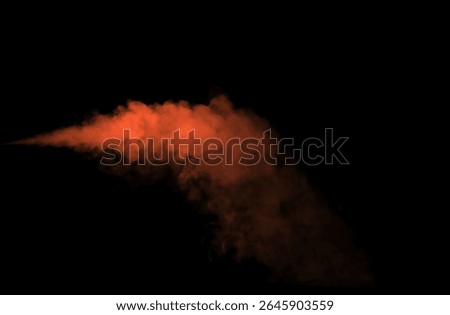 
Orange smoke effect floating on black background. Abstract bright and intense background. Fog or smoke.