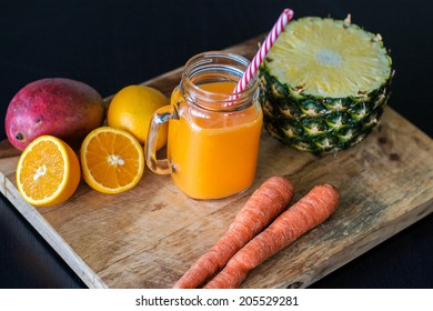 Orange Smoothie With Carrots, Mango,coconut Water And Pineapple