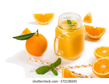  Orange Smoothie And Orange Fruits With Green Leaves Isolated On White Background.