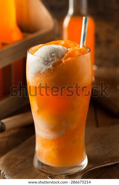 Orange Soda\
Creamsicle Ice Cream Float with a\
Straw
