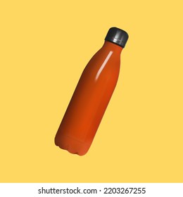 Orange Sports Water Bottle On Yellow Background