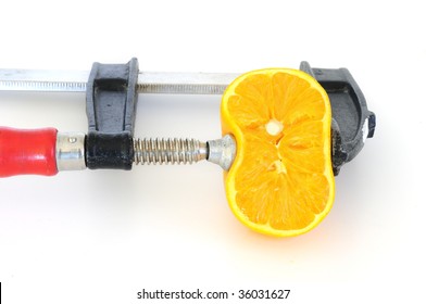 Orange Squeezed By A Bar Clamp