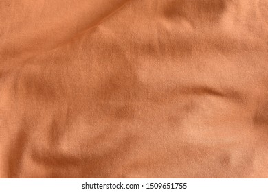 orange striped fabric as background