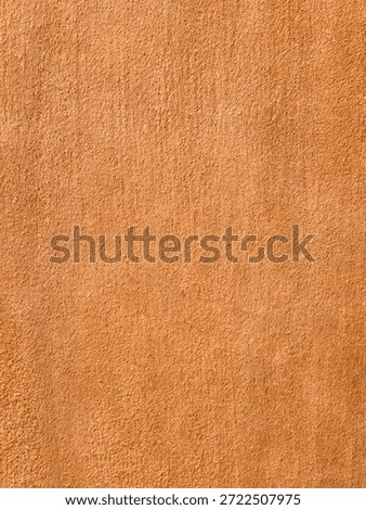 Orange Stucco Wall Texture Background with Rough Plaster Surface