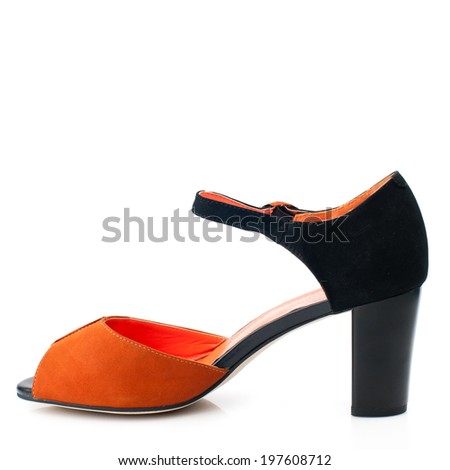 Orange suede women shoe isolated on white background.
