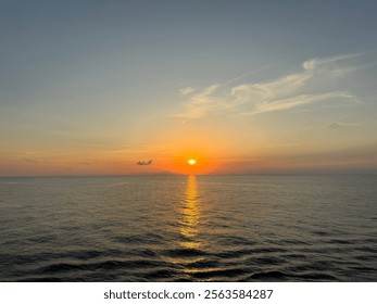 Orange sunset going down on the horizon 