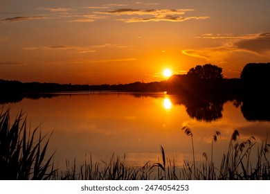 orange sunset on the lake - Powered by Shutterstock