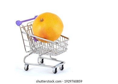 Orange Orange In A Supermarket Trolley On A White Background