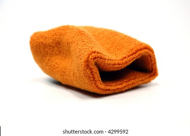 An Orange Sweat Band On White Background