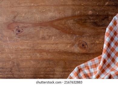 Orange Table Cloth On Wooden Background 